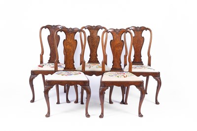 Lot 860 - A set of five George I style walnut dining chairs