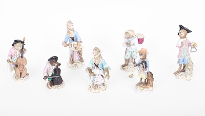 Lot 799 - A porcelain monkey band