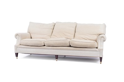 Lot 799 - A modern three-seater sofa by George Smith