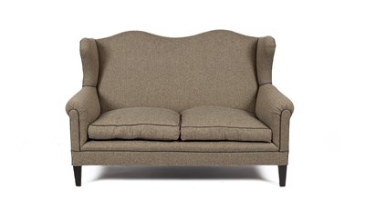 Lot 263 - A two-seater humpback winged sofa