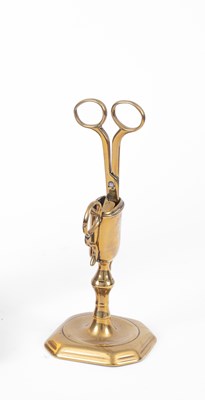 Lot 372 - A brass candlesnuffer and stand