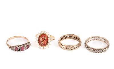 Lot 43 - Four yellow metal dress rings