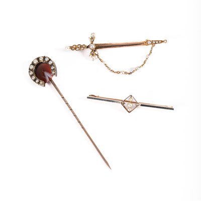 Lot 47 - Three pearl set pins