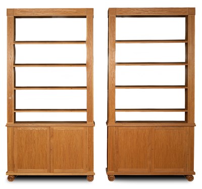 Lot 855 - A pair of bespoke oak veneered bookcases