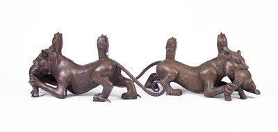 Lot 242 - A large pair of Asian bronze figures depicting stylised leopards mauling cattle