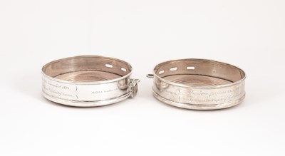 Lot 131 - A pair of Scottish silver novelty wine coasters