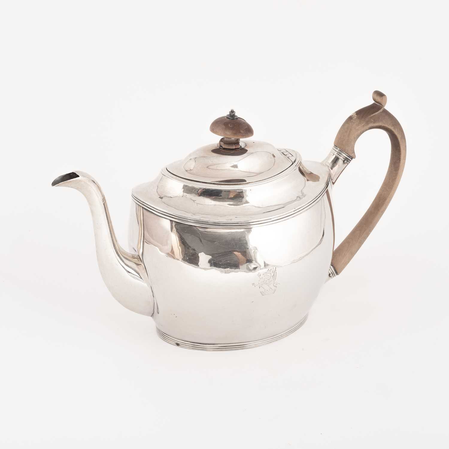Lot 29 - A George III oval silver teapot