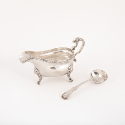 Lot 30 - A George II silver sauce boat