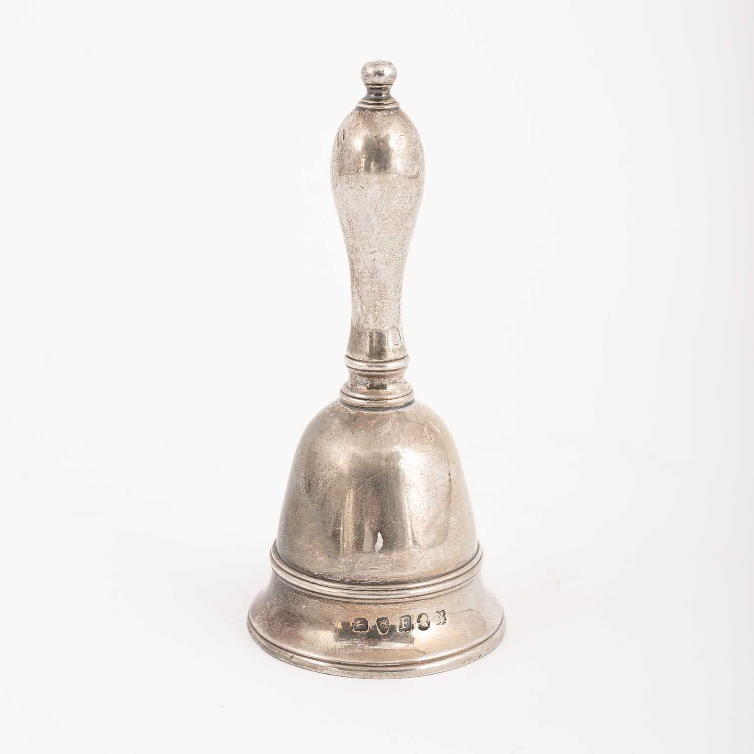 Lot 31 - A George III cast silver table bell
