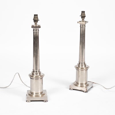 Lot 383 - A pair of silver plated table lamps