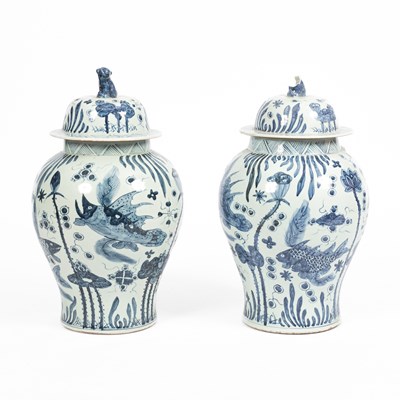 Lot 236 - A pair of Chinese porcelain blue and white jars and covers