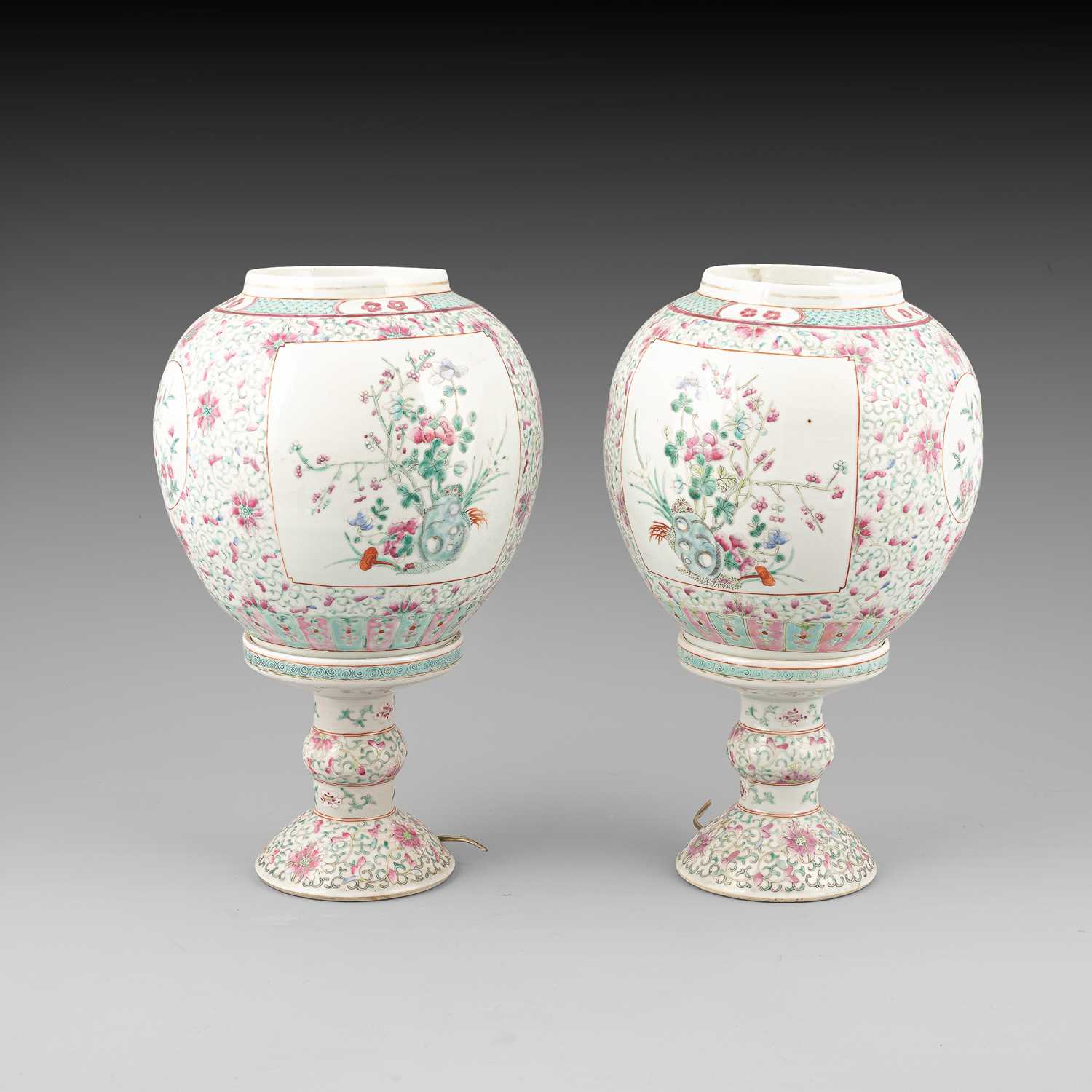 Lot 291 - A pair of Chinese famille rose globular lanterns and stands