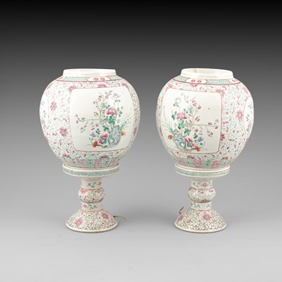 Lot 291 - A pair of Chinese famille rose globular lanterns and stands