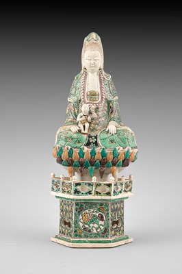 Lot 292 - A Chinese enamel on biscuit figure of Guanyin