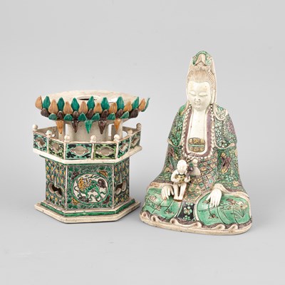 Lot 292 - A Chinese enamel on biscuit figure of Guanyin