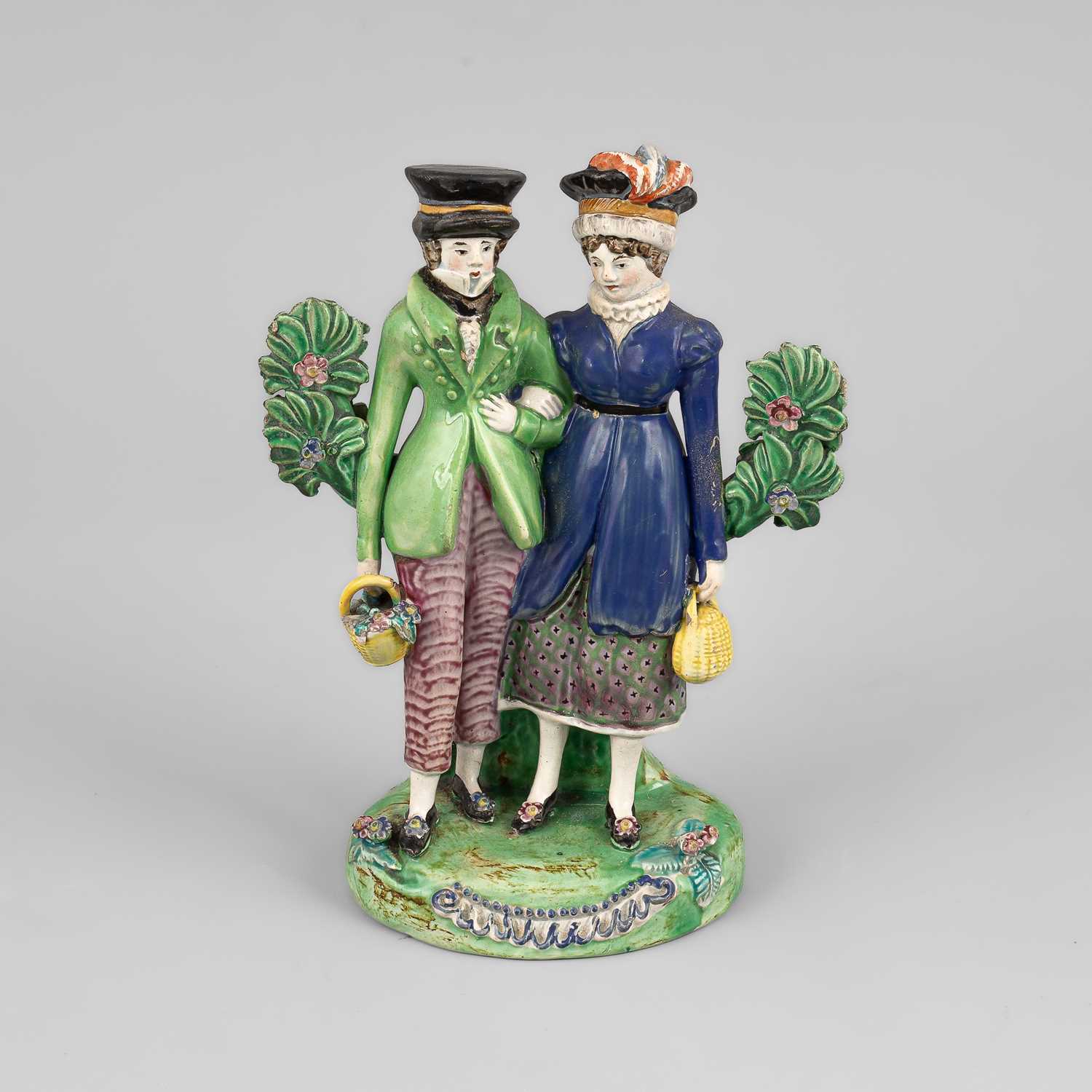Lot 318 - A Staffordshire pearlware figure of Dandies