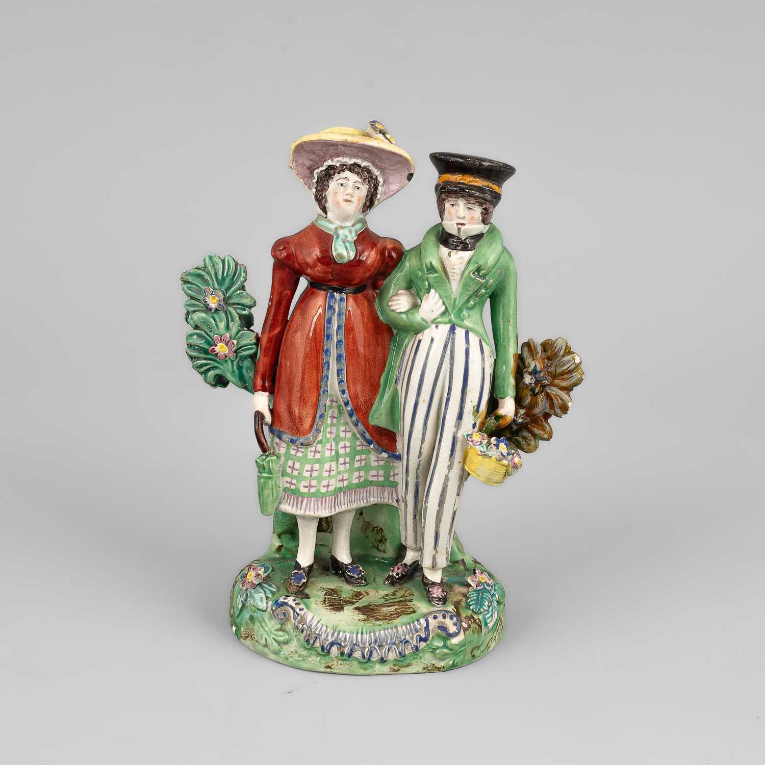 Lot 319 - A Staffordshire pearlware figure of Dandies