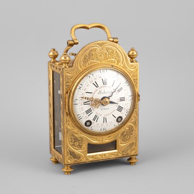 Lot 438 - A 19th Century ormolu and glazed striking travel clock