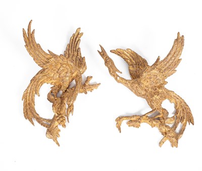 Lot 507 - A pair of carved and gilded hoho bird wall appliques