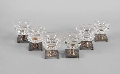 Lot 134 - A set of six cut glass and silver salt cellars
