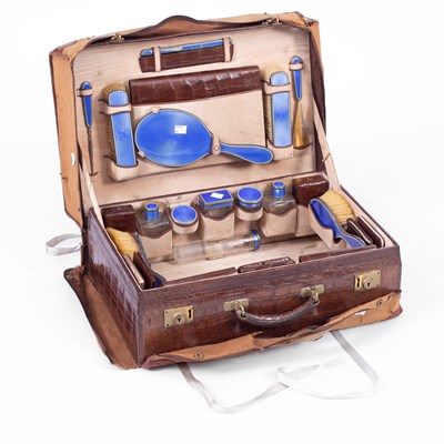 Lot 365 - An early 20th Century crocodile travelling vanity case
