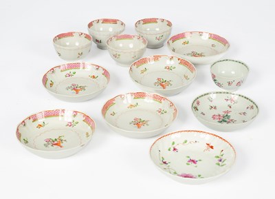 Lot 262 - A part set of four English porcelain tea bowls and five saucers