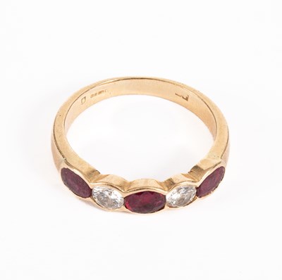 Lot 69 - An ruby and diamond five stone ring