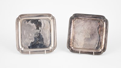 Lot 386 - A pair of George I Britannia standard silver card waiters