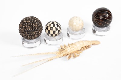 Lot 389 - Five decorative shell and bone items