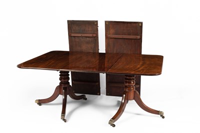 Lot 788 - A late Regency mahogany twin pedestal dining table