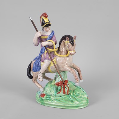 Lot 295 - A Staffordshire pearlware figure of George and the Dragon