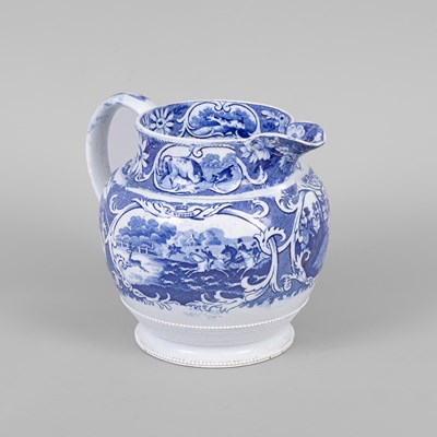 Lot 296 - An English pearlware blue and white printed sporting jug