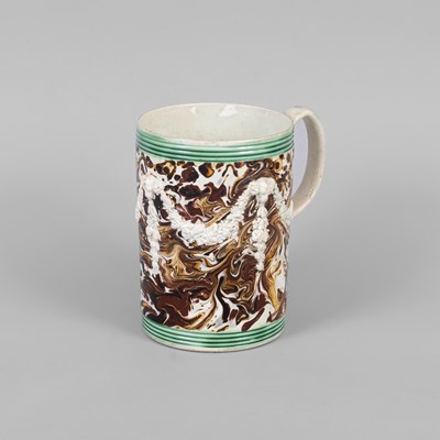 Lot 297 - A creamware mug
