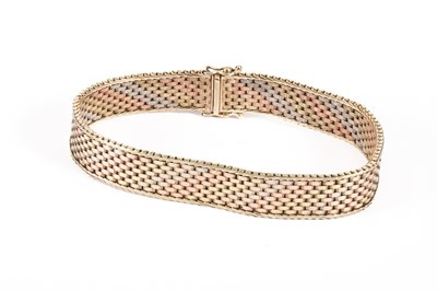 Lot 12 - A 9ct tri-colour gold woven bracelet