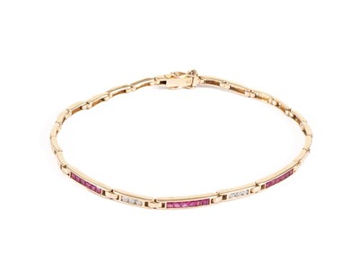 Lot 14 - A 9k gold, ruby and diamond line bracelet