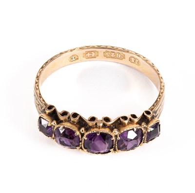 Lot 25 - A Victorian 15ct gold and amethyst five-stone ring