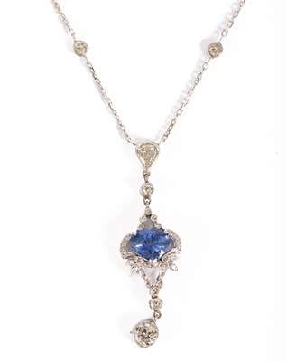 Lot 35 - An Edwardian style sapphire and diamond pendant necklace