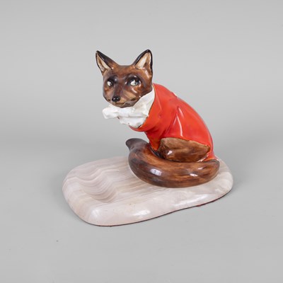 Lot 307 - A model of a fox, wearing a red hunt jacket