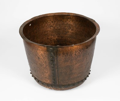 Lot 901 - A riveted hammered copper