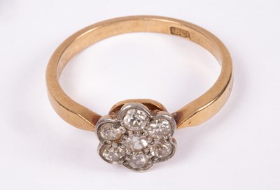 Lot 76 - An Edwardian 18ct gold and diamond flower head ring