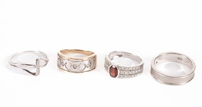 Lot 54 - Four diamond set dress rings