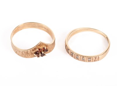 Lot 57 - Two gem set dress rings