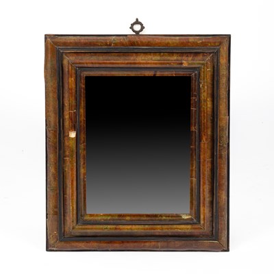 Lot 808 - A tortoiseshell veneered wall mirror