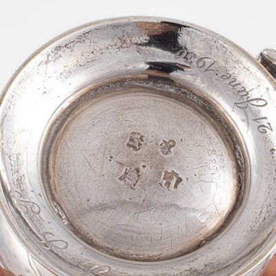 Lot 387 - A George II silver mug