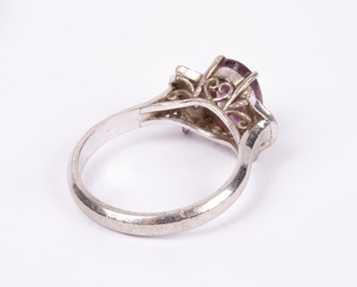 Lot 42 - An 18K white gold ruby and diamond ring