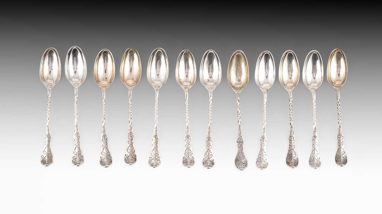 Lot 399 - A set of twelve Continental white metal teaspoons