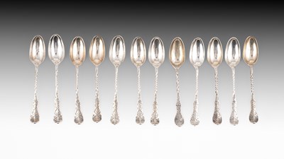 Lot 399 - A set of twelve Continental white metal teaspoons