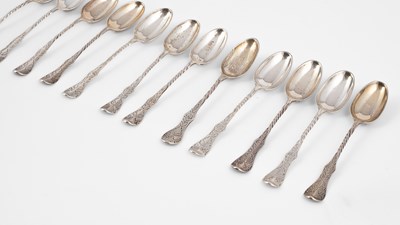 Lot 399 - A set of twelve Continental white metal teaspoons