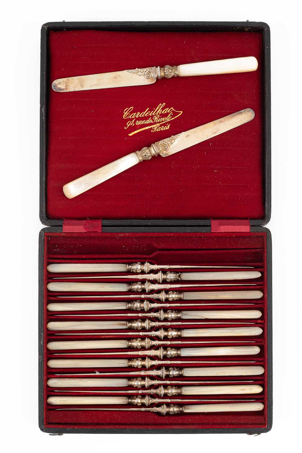 Lot 402 - A set of eighteen French mother-of-pearl handled knives