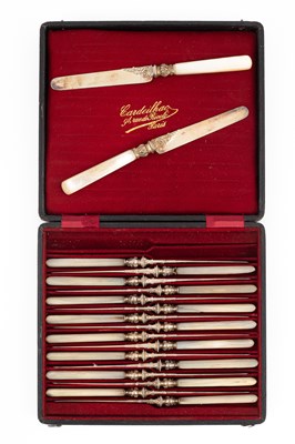 Lot 402 - A set of eighteen French mother-of-pearl handled knives